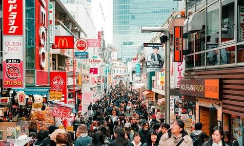 Image of crowded shopping street in Harajuku, Japan